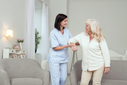 caregiver and senior smiling